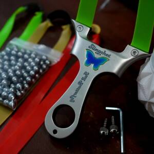 1 Full Butterfly Slingshot + 3 Bands + 144 Steel Balls + 2 Extra Nuts + 1 L key