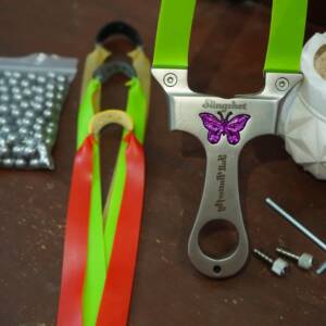 1 Butterfly Slingshot + 3 Bands + 144 Steel Balls + 2 Extra Nuts + 1 L key