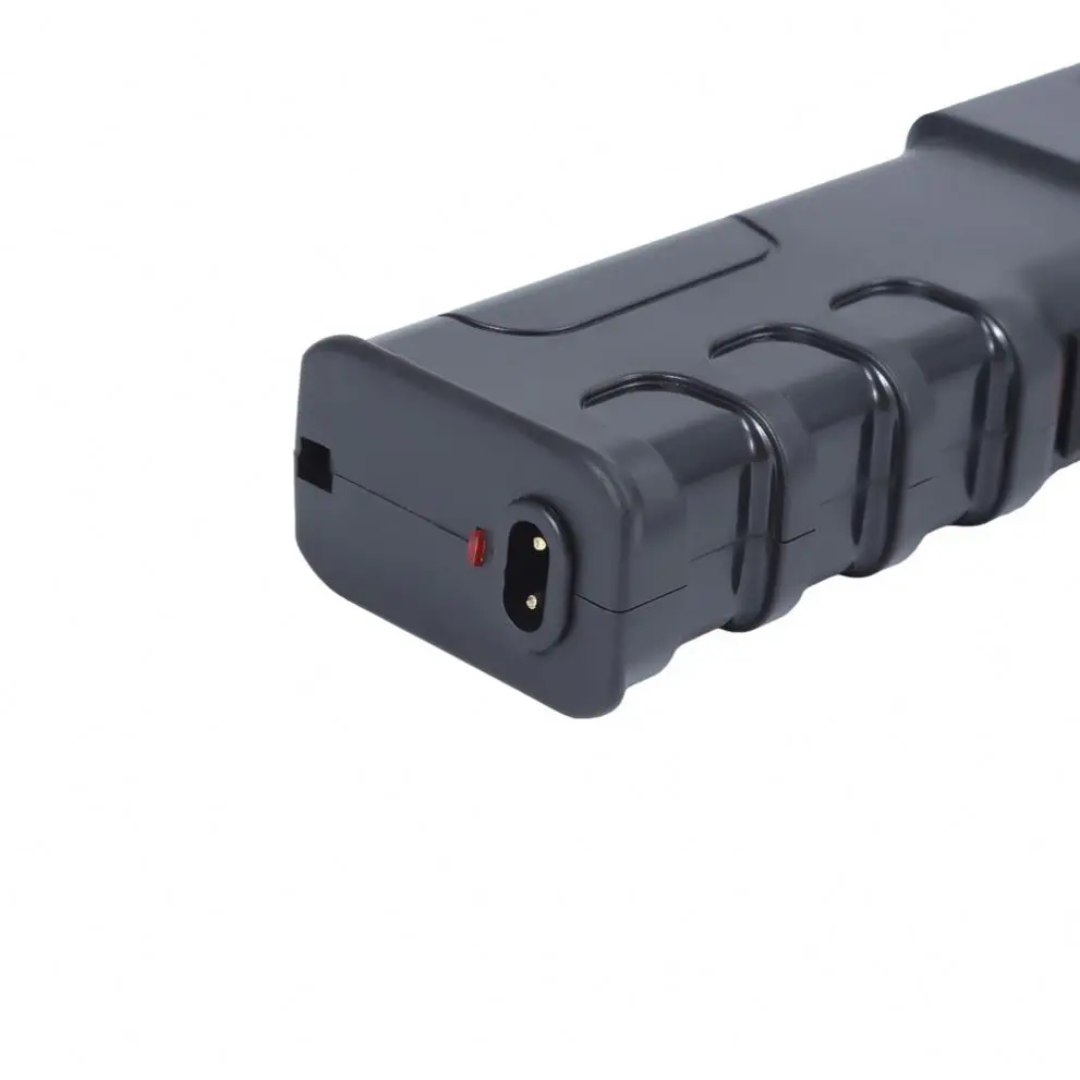 Self-Defense Stun Gun paired with its dedicated charging cable - Image 3